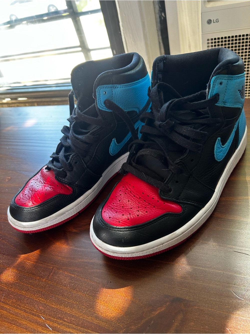 Jordan High-Top Sneakers in Black, Red & Blue